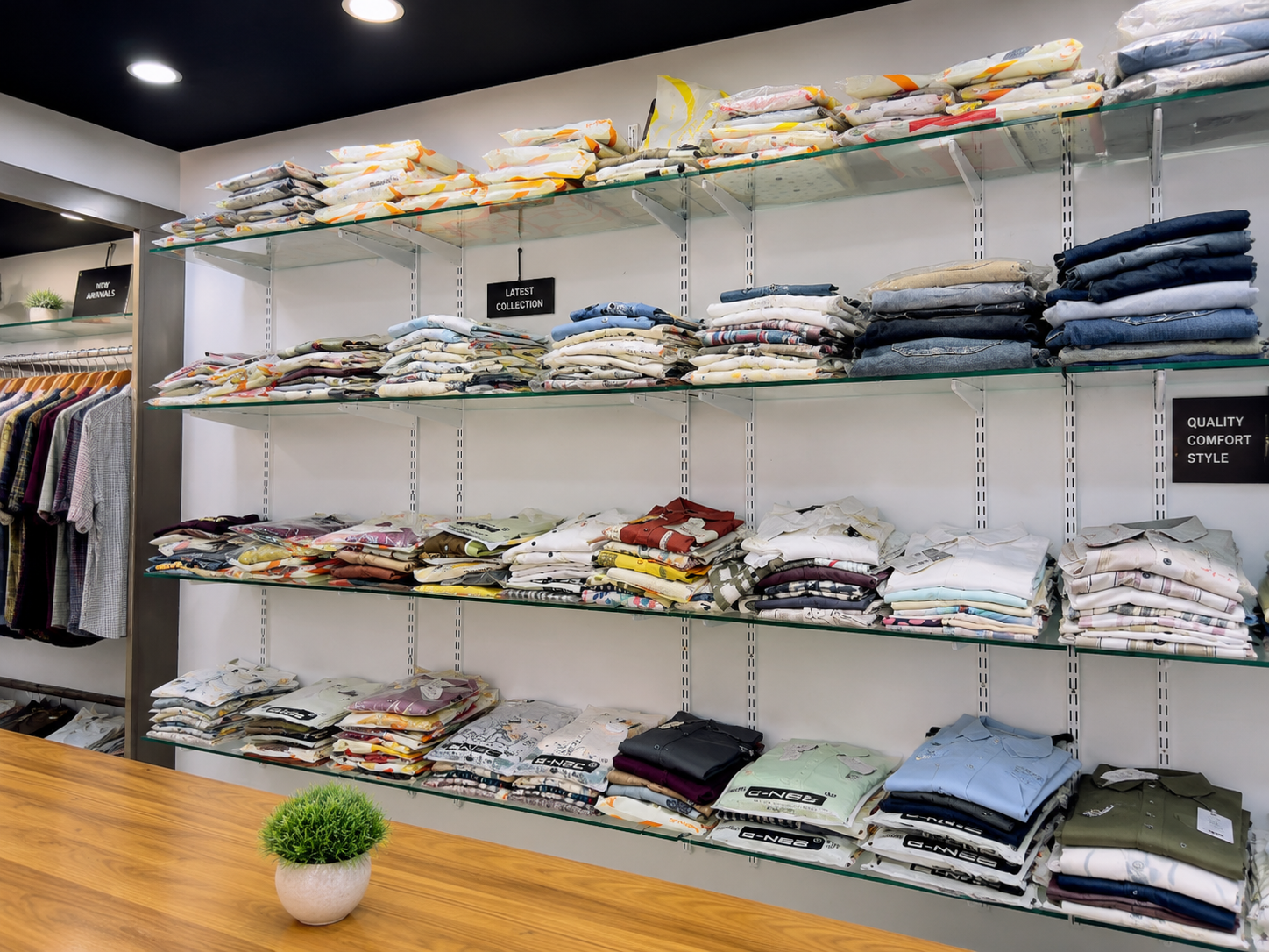 Shelves of shirts and jeans inside Dark Zone Mens Wear